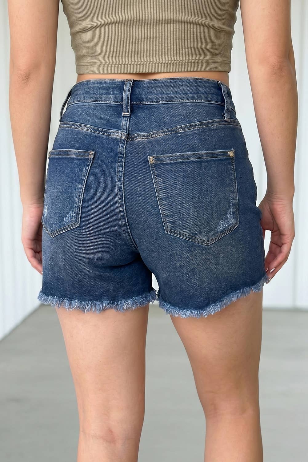 Asymmetric Raw Hem Distressed Denim Shorts