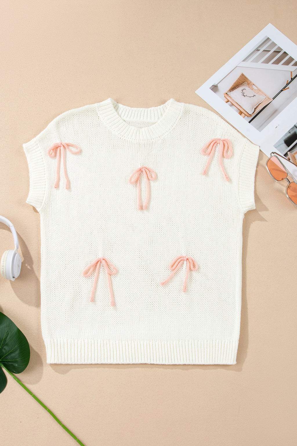 White knit bow sweater