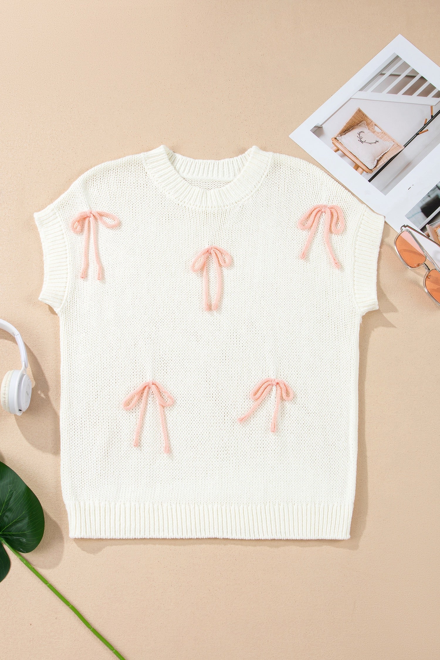 White knit bow sweater