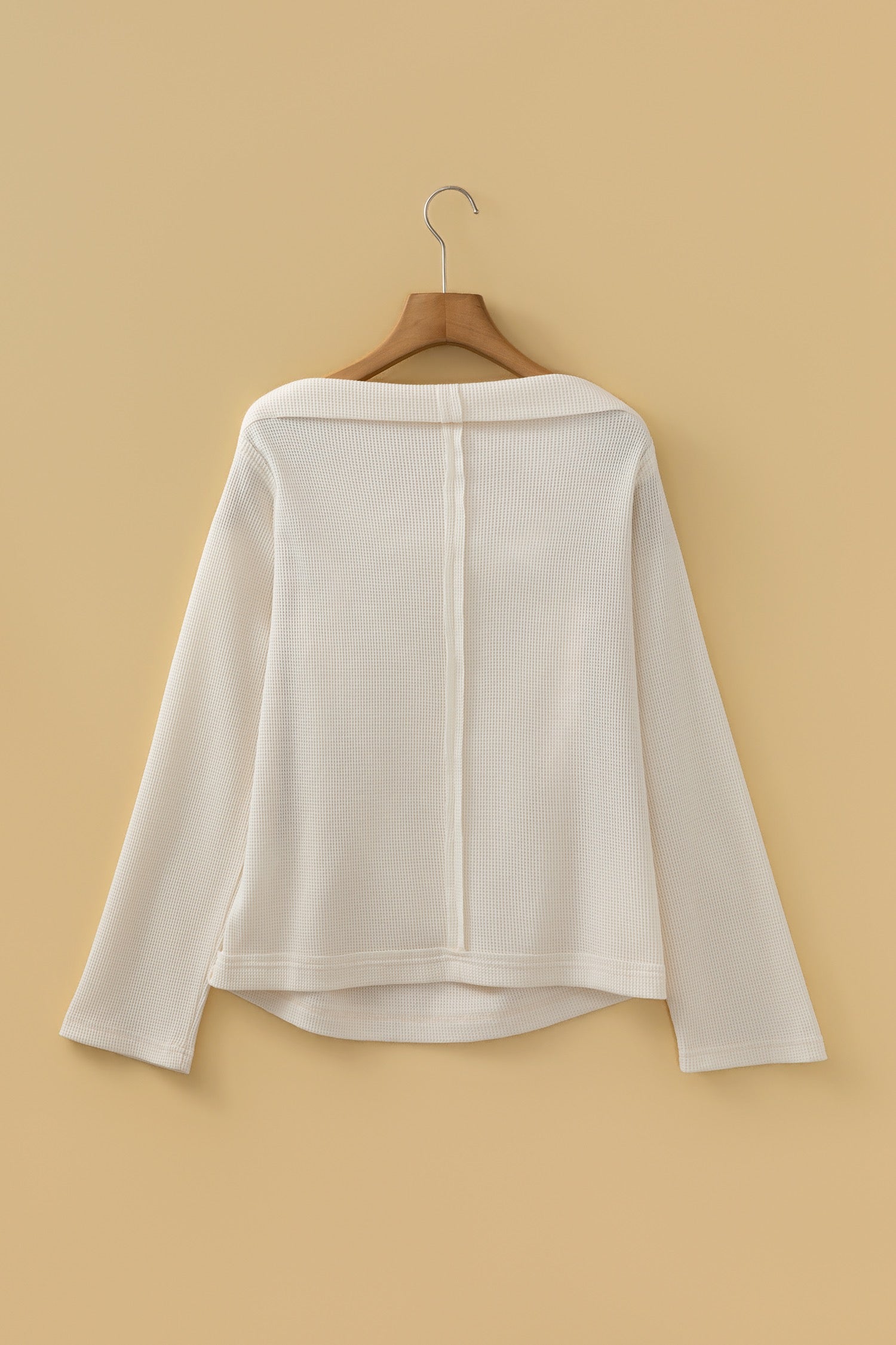 Waffle knit asymmetrical sweater