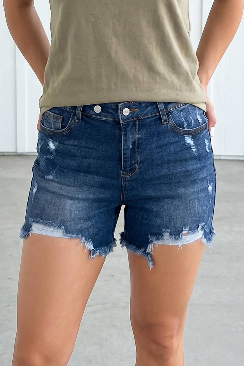 Asymmetric Raw Hem Distressed Denim Shorts